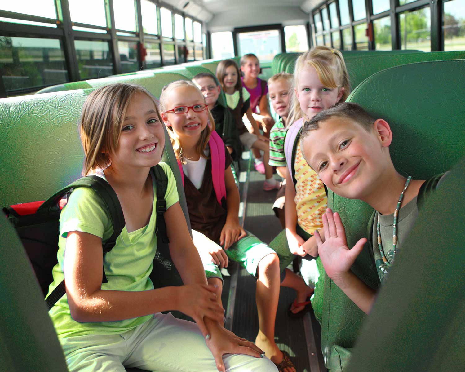 Kids sitting in a school bus